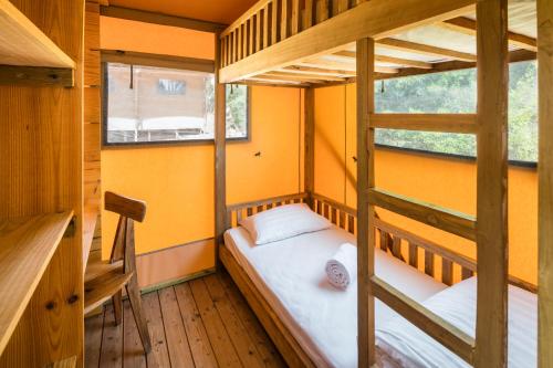 Ένα ή περισσότερα κρεβάτια σε δωμάτιο στο Casa Tuia Resort