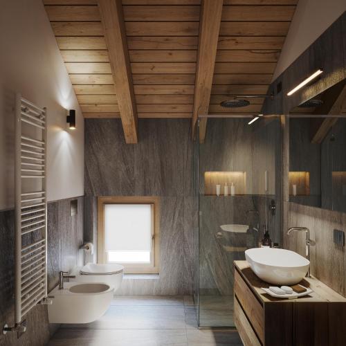 a bathroom with two sinks and two toilets at Ma Chérie in Livigno