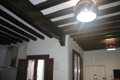 Televízia a/alebo spoločenská miestnosť v ubytovaní Apartamento Tres Culturas