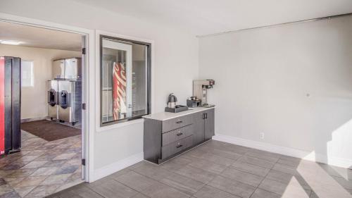 a kitchen with a sink and a counter in a room at Studio 6 Elko, NV in Elko