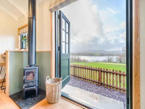 a view from the living room with a wood stove at Hut Uk42176 in Usk