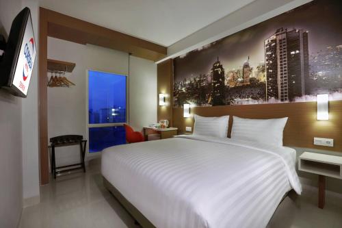 Tempat tidur dalam kamar di Cordela Senen Jakarta
