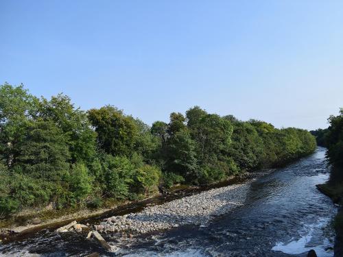 a river with trees on the side of it at Cray House - Ukc4632 in Glenshee