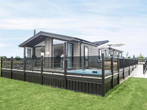 a house with a swimming pool in the yard at Trincomalee Lodge - Ukc4057 in Nunthorpe