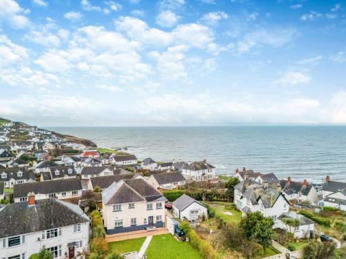 an aerial view of a houses and the ocean at Bryndedwydd in Borth