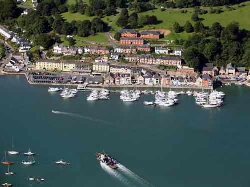 an aerial view of a harbor with boats in the water at Meadow Barn - Blackdown Farm in Blackawton