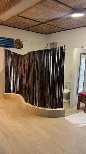 a stage with a curtain in a room at Bayside Island in Cartagena de Indias
