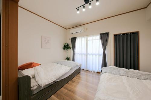 41m2 Family Apartment , Ground Floor , Sleeps 5 , 9 Min to Matsuyama Station