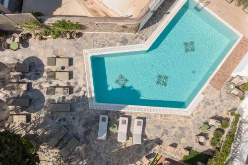 an overhead view of a swimming pool at a resort at Despotiko Hotel in Mikonos