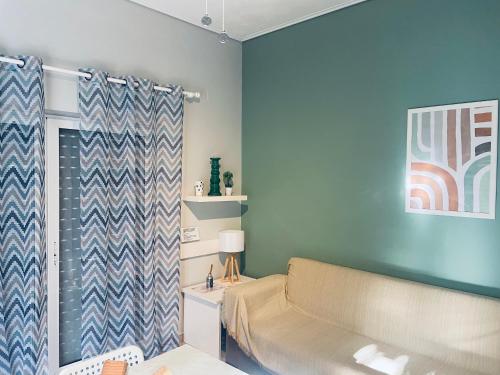 a living room with a couch and a shower at Villa Sofia in Chrani