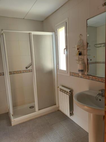 a bathroom with a shower and a sink at Balcones Azules in Cartagena
