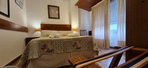 a bedroom with a bed and a window at Continental Hotel in Miramar