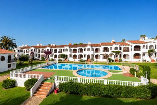 an aerial view of a large estate with a swimming pool at Turquoise Menorca By the Sea in Son Bou