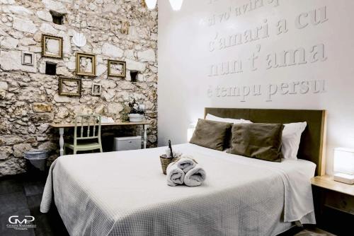Postel nebo postele na pokoji v ubytování B&B Siracusa