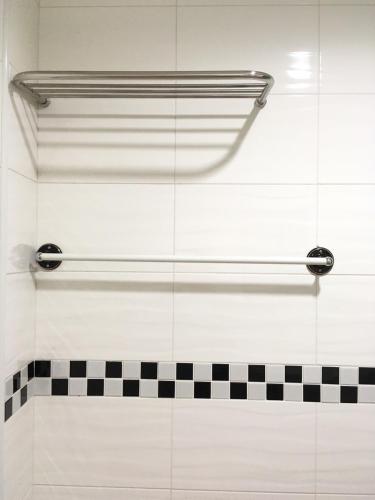 Ett badrum på HFun Hotel