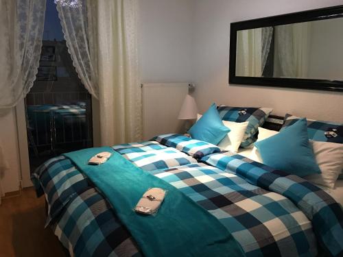Säng eller sängar i ett rum på City Apartments Will