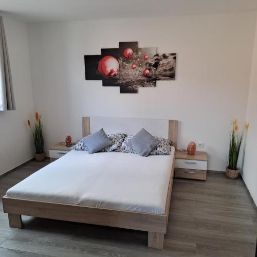 a bedroom with a large bed with at Vejminek 87 in Červená Třemešná