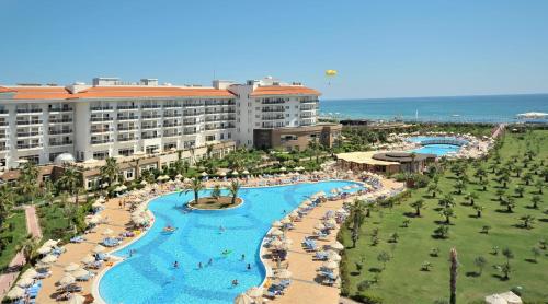 an aerial view of a resort with a swimming pool at Seaden Sea World Resort & Spa All Inclusive in Kizilagac