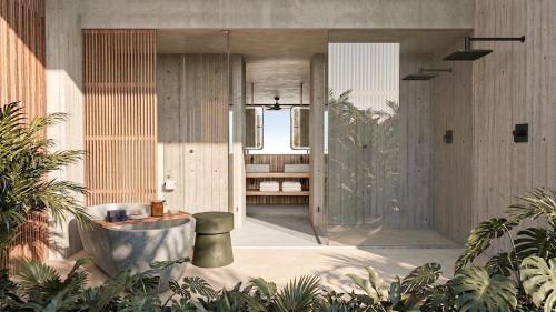a bathroom with a shower and a bench in a room at NANANA Hotel de Mar - Solo Adultos in Puerto Escondido