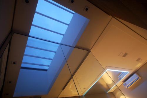 a skylight in the ceiling of a building at Zaya Motel Premium in Florianópolis