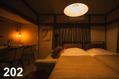 MOONLIGHT KEISEI KOIWA HOTEL 2-Minute Walk from Keisei Koiwa Station Washer & Dryer Included Completely Non-Smoking Perfect for Long Stays Direct Access to Ueno, Asakusa, and Narita Airport