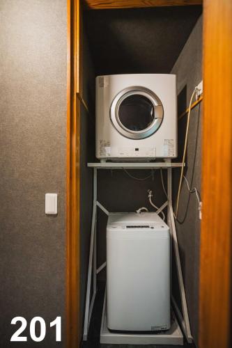 MOONLIGHT KEISEI KOIWA HOTEL 2-Minute Walk from Keisei Koiwa Station Washer & Dryer Included Completely Non-Smoking Perfect for Long Stays Direct Access to Ueno, Asakusa, and Narita Airport
