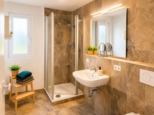 ห้องน้ำของ Norddorf Hideaway-Ruhige Ferienwohnung auf Amrum