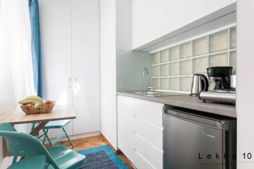 Kuchyňa alebo kuchynka v ubytovaní Lekka 10 Apartments