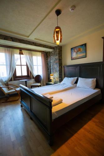 a bedroom with a large bed in a room at Luxury Villa Medusa Temple in Kruševo