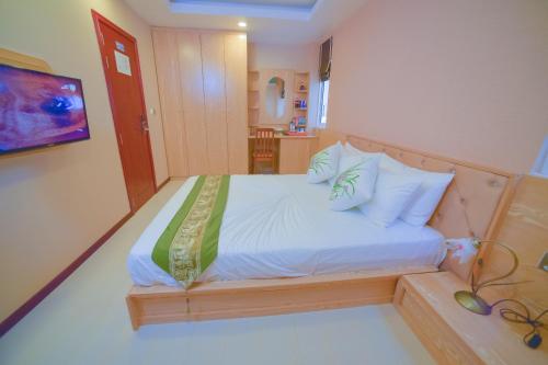 Postel nebo postele na pokoji v ubytování Hathaa Beach Maldives