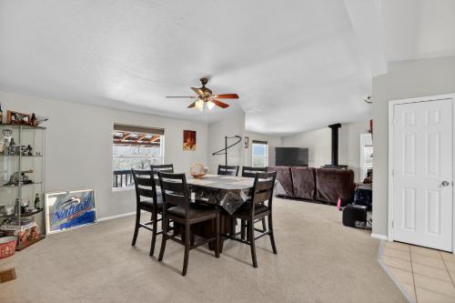 a dining room and living room with a table and chairs at Tehachapi 12-Guest Group Escape home in Tehachapi