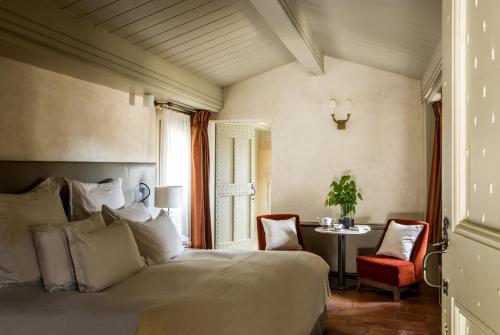 Postel nebo postele na pokoji v ubytování La Maison d'Uzès Relais & Châteaux