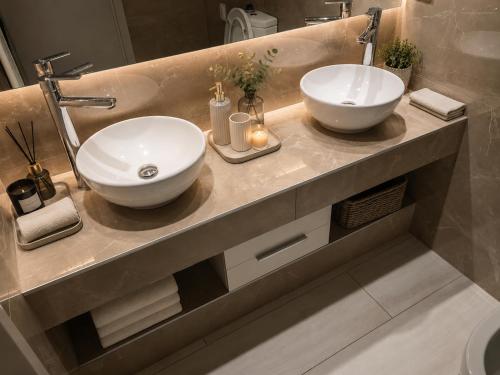 a bathroom with two sinks on a counter at FORUM Square in Skopje