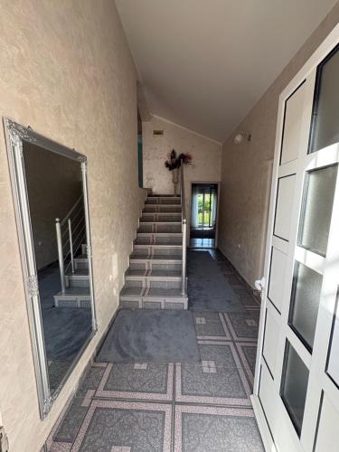 an empty hallway with stairs in a building at Blue Escape in Danilovgrad