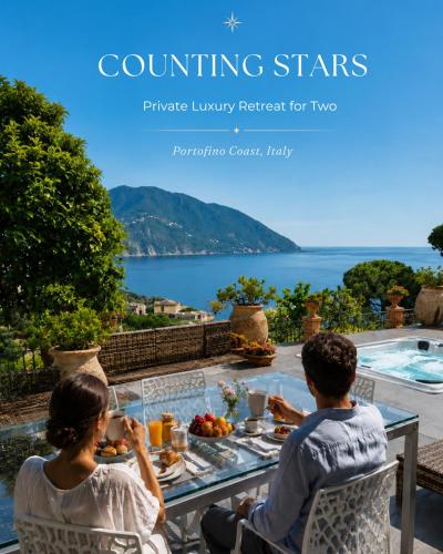 a man and a woman sitting at a table eating food at Counting Stars - Private Luxury Retreat for Two in Recco