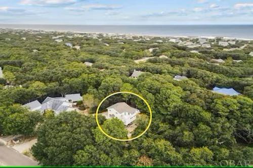 an aerial view of a house in the woods at 3BR 3BA Beach House in Kitty Hawk Beach