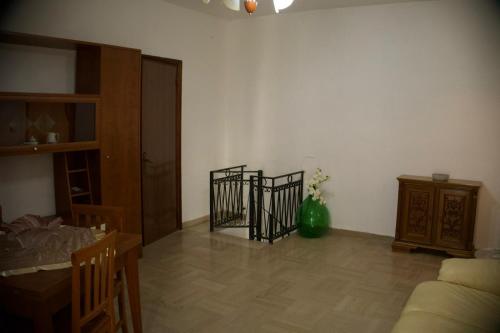 a living room with a couch and a table at Casa Luisa in Peschici