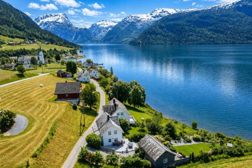 an aerial view of a village on the shore of a lake at Villa Lilleheim in Breim