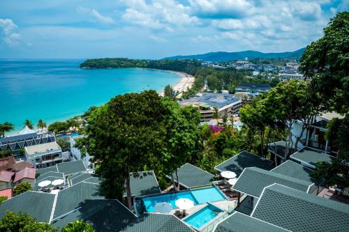 a view of the beach from a resort at Anthiya Seaview Villa Hotel Phuket in Kata Beach