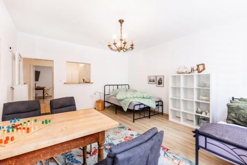 a living room with a table and chairs at Apartment in Bayreuth in Bayreuth