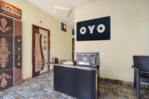 a hotel room with a ovo sign on the wall at HOTEL O STAR INN in Raipur