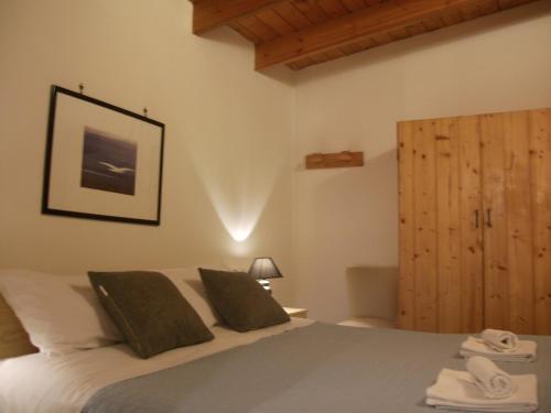 Un pat sau paturi într-o cameră la Villa Davima