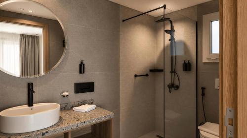 a bathroom with a sink and a shower at Selena Bay Hotel Suites in Hurghada