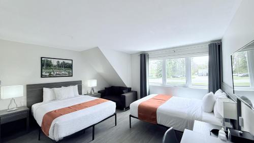 Krevet ili kreveti u jedinici u okviru objekta Amber Hotel