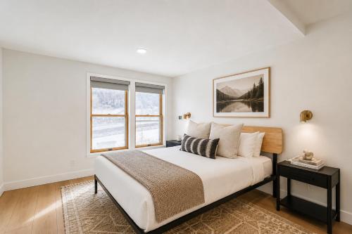 a bedroom with a large bed and a window at Pet Friendly! Elevation 25 in Park City