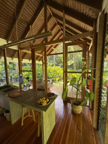 a room with a table with bananas on it at Dalakit House Villa Two in Siquijor