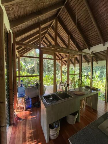 a kitchen with a sink and a counter top at Dalakit House Villa Two in Siquijor