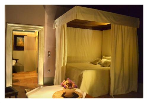 聖波羅1544仿古客房住宿加早餐旅館房間的床
