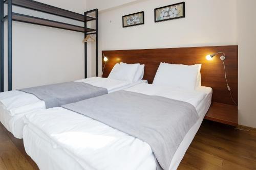 Postel nebo postele na pokoji v ubytování Monte Hotel