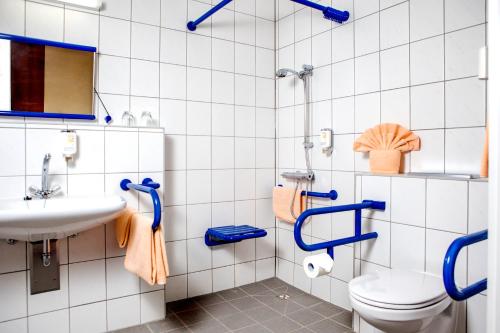 Koupelna v ubytování Hotel Wilna